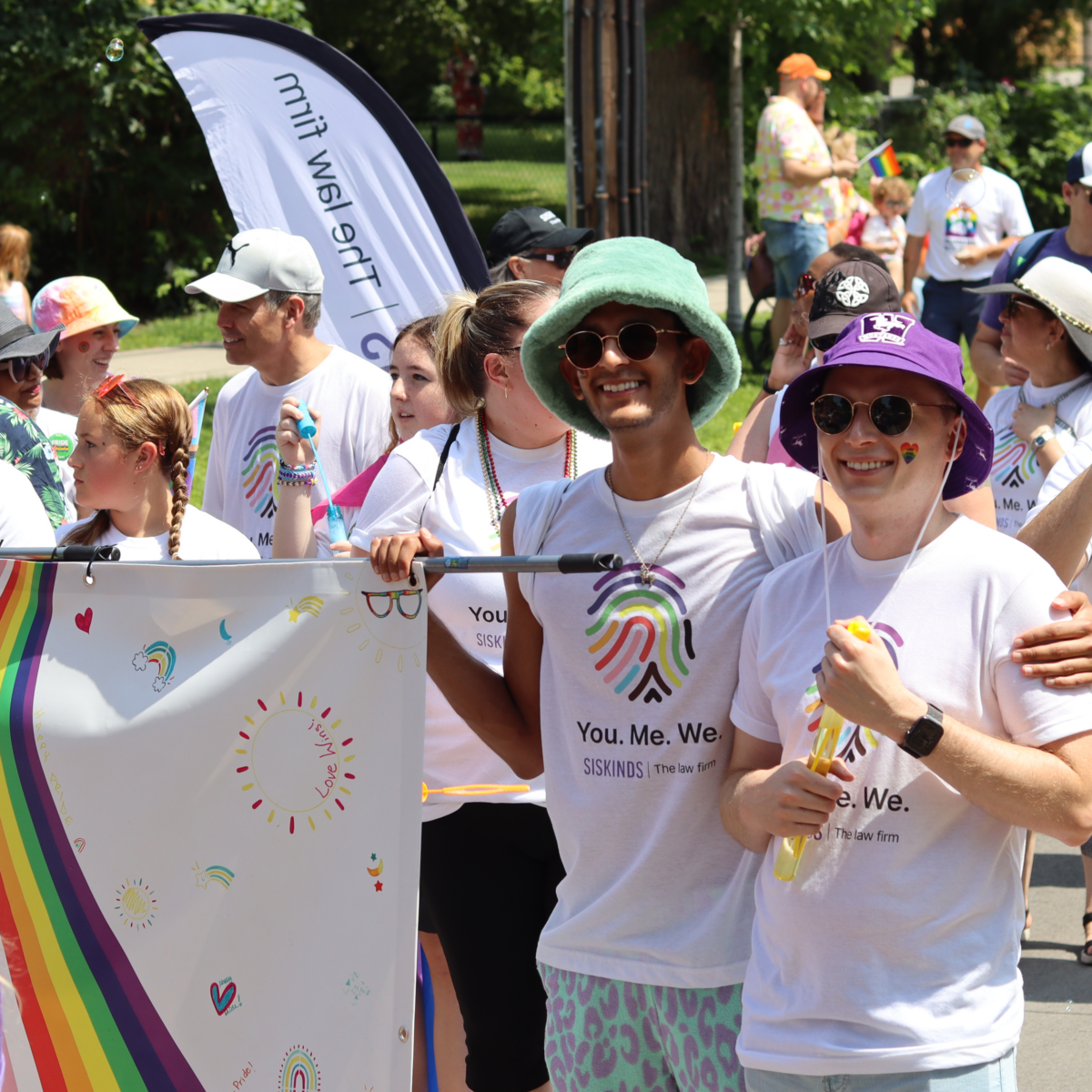 Participants at the London Pride Parade, including summer student Raza Husnain.