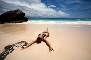 sunbather by the water